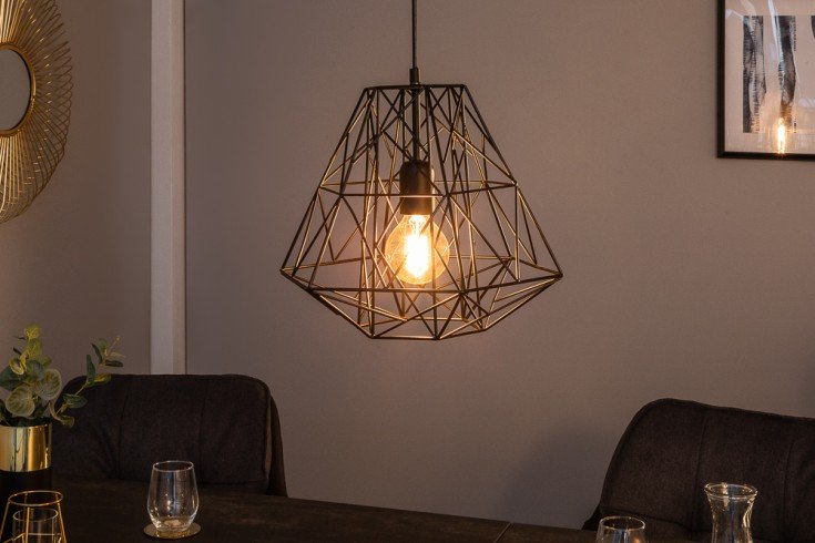 Zu sehen ist eineGlühlampe die von einem Oktagramm förmigen Käfig umgeben ist.